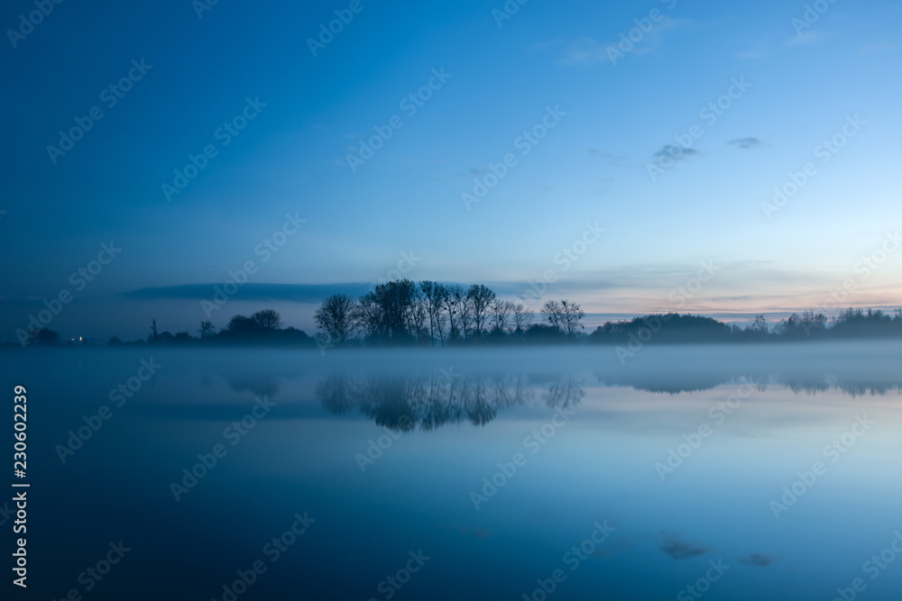 Fog on the lake after sunset