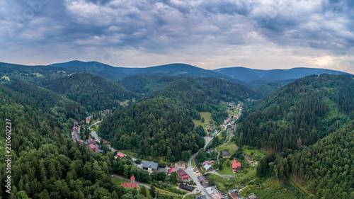 Fototapeta Naklejka Na Ścianę i Meble -  Międzygórze with panorama of Sudety mountains aerial view