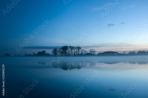 Fog on the lake after sunset