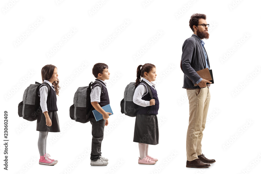 Fototapeta premium Schoolchildren waiting in line behing male teacher