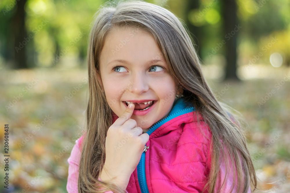 Portrait of toothless child girl missing milk and permanent teeth. Portrait of toothless child girl missing milk and permanent teeth.
