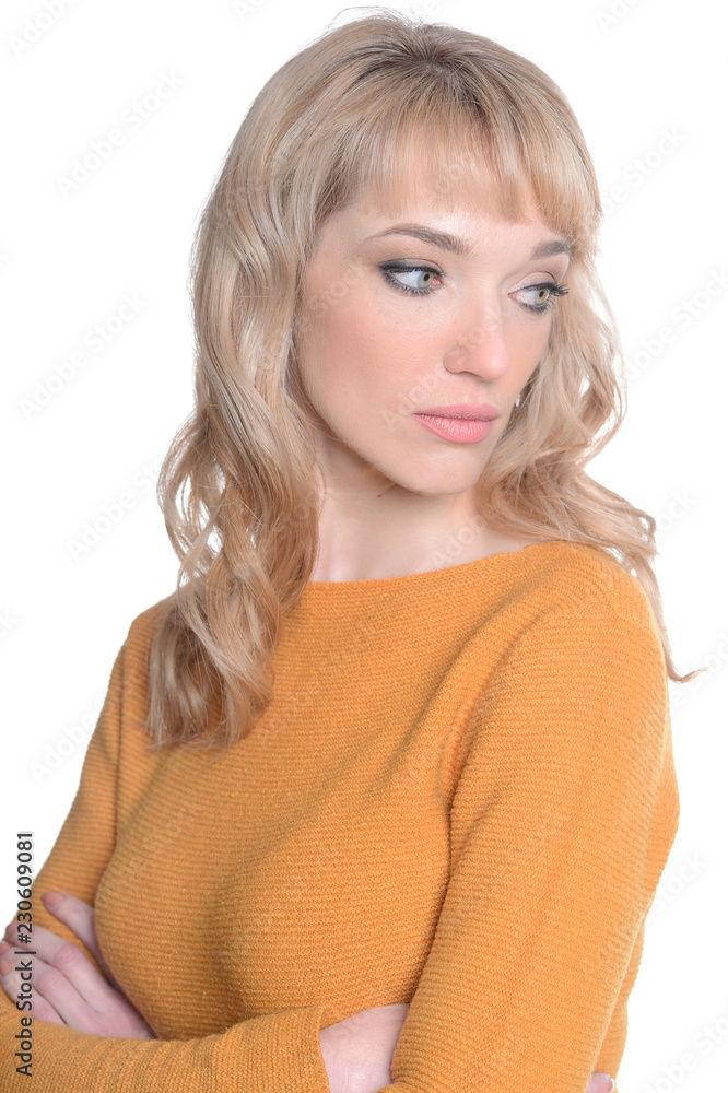Naklejka premium Portrait of beautiful sad woman on white background