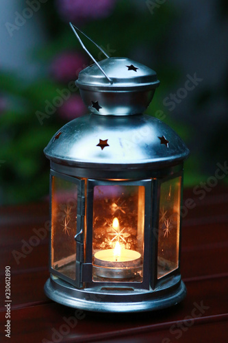 Classical retro  lantern with candle  Vintage style glowing lamp as a background
