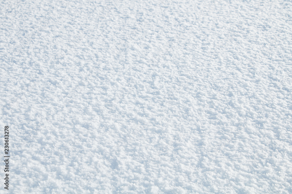 Winter background. Texture of fresh cold white snow.