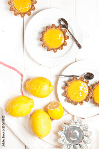 Lemon tart on white plate. Top view