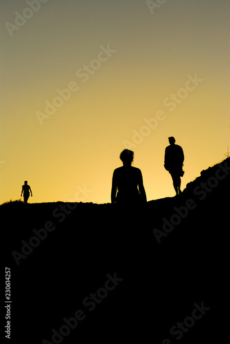 People silhouette walking