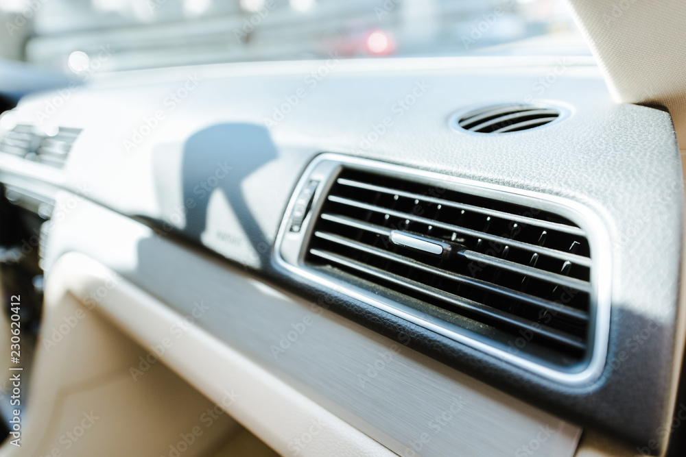 close up of car air conditioner grid panel