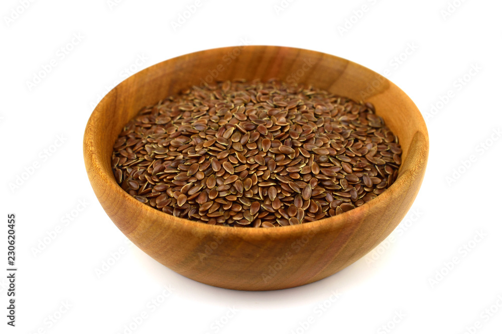 Isolated Flax Seed in Wooden Bowl (Flaxseed). Isolated Flax Seed in Wooden Bowl (Flaxseed).