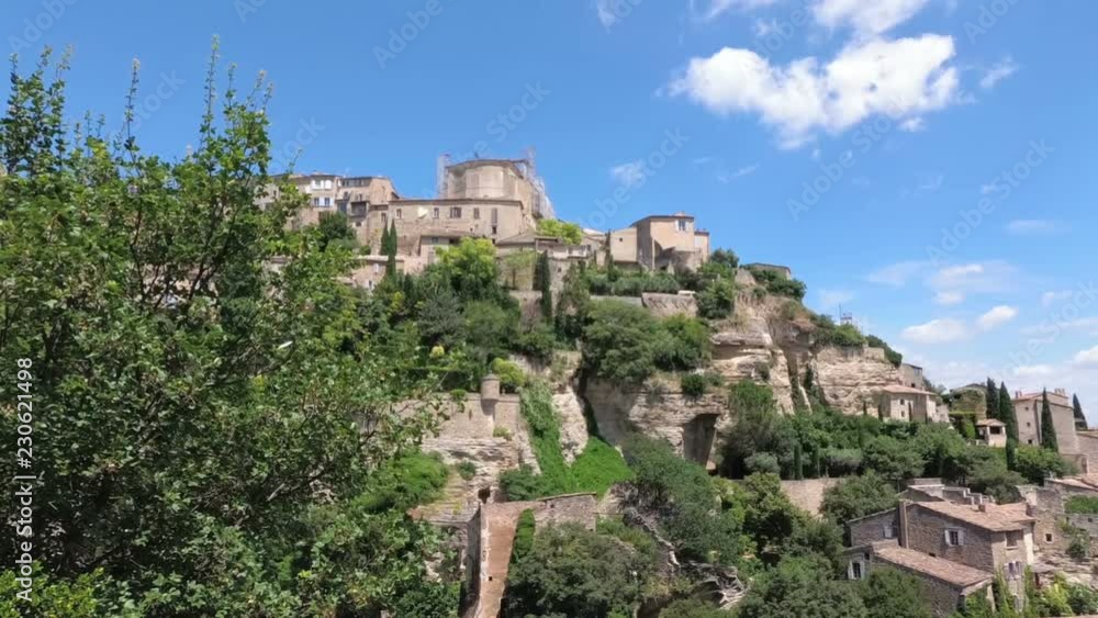 Walking with a video camera in the ancient French town of Gordes. Provence. France. Slow motion. Walking with a video camera in the ancient French town of Gordes. Provence. France. Slow motion.
