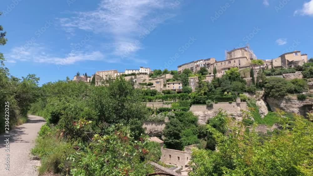 Walking with a video camera in the ancient French town of Gordes. Provence. France. Slow motion. Walking with a video camera in the ancient French town of Gordes. Provence. France. Slow motion.