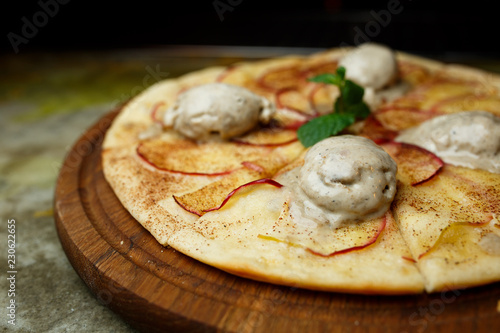 Pizza with pears and ice cream photo