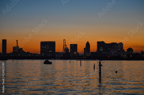 tokyo harbour skyline at sunset from odaiba