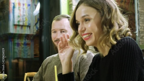 Wallpaper Mural European food. Happy beautiful young man and woman having dinner in a restaurant. 4K Torontodigital.ca