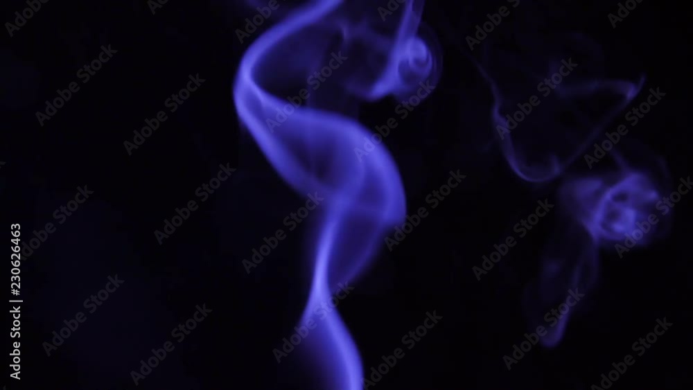 Blue Steam Rises from up. Blue smoke over a black background. Smoke slowly floating through space against black background. Slow Motion. Blue Steam Rises from up. Blue smoke over a black background. Smoke slowly floating through space against black background. Slow Motion.