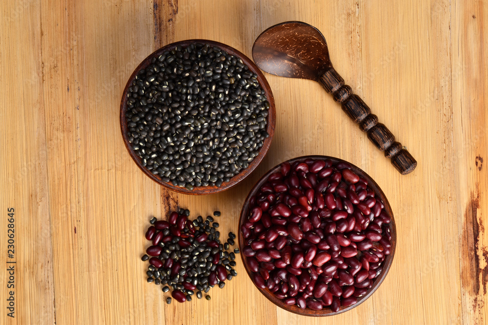 rajma and uradh dal in bowl on wooden background,