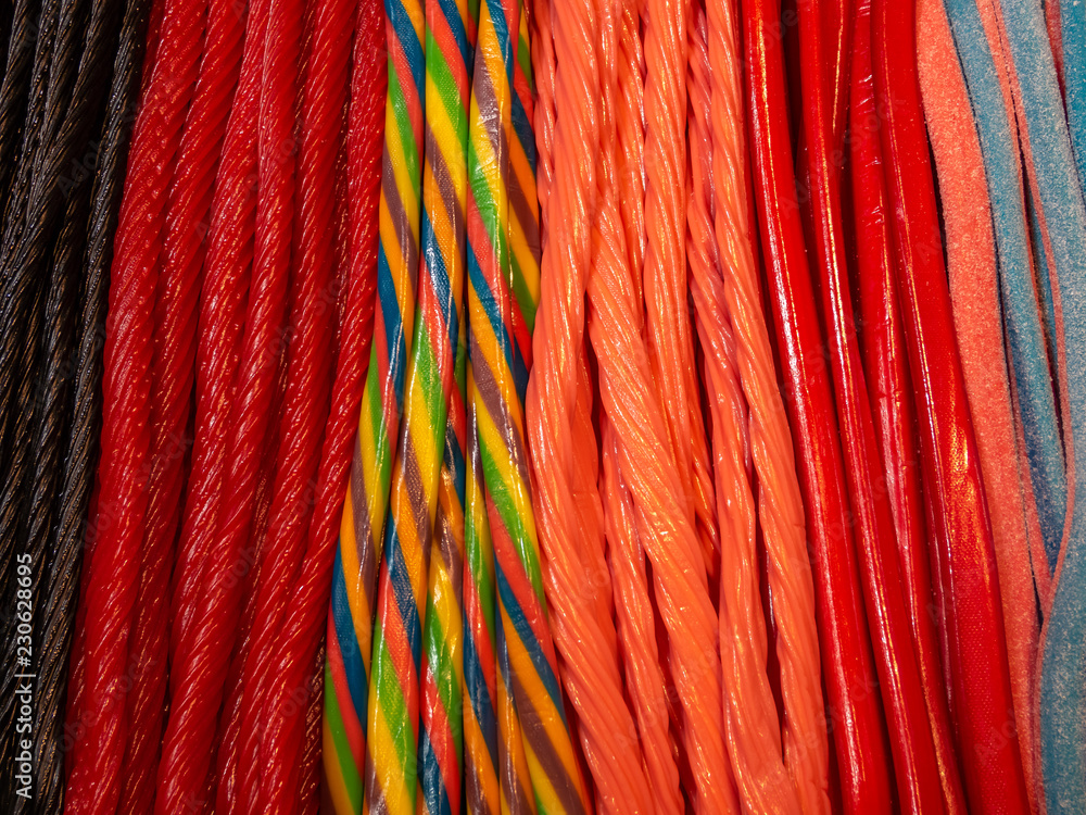 Black, Red, Pink and Multicolor Candy In Bright Light