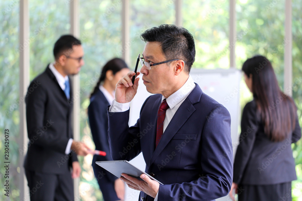 Senior business man asia with Business Group Meeting Discussion Strategy Working Concept. Senior business man asia with Business Group Meeting Discussion Strategy Working Concept.