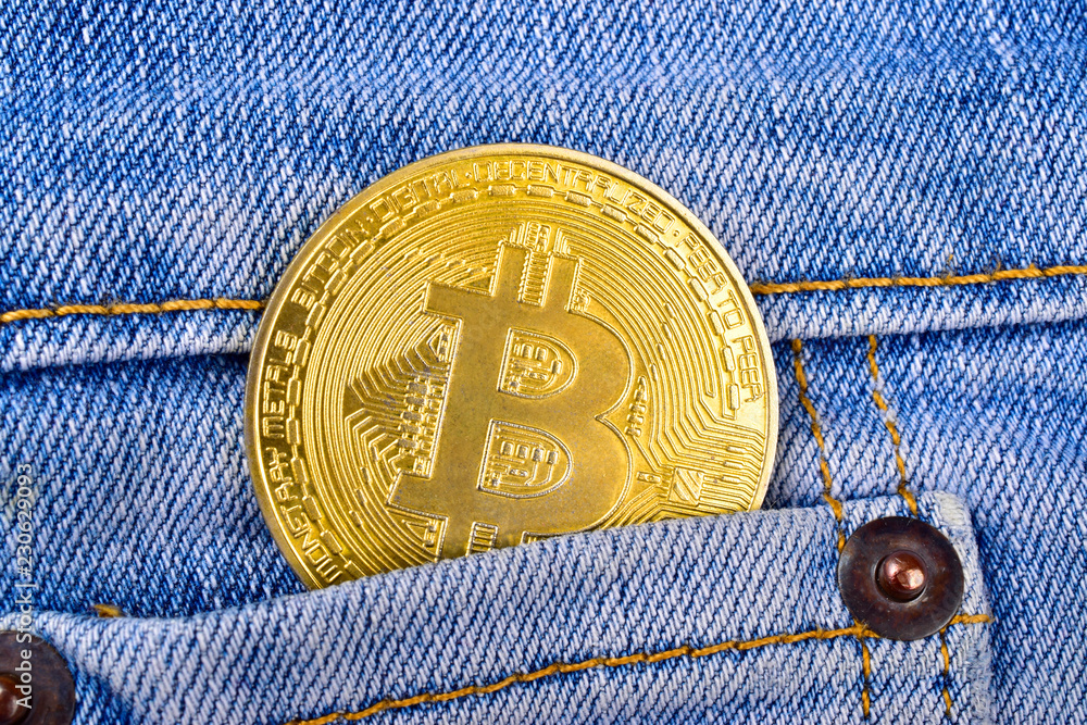 bitcoin concept, cryptocurrency coin in jeans pocket bitcoin concept, cryptocurrency coin in jeans pocket
