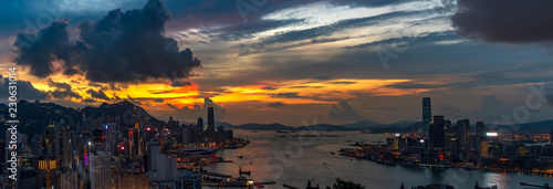 panorama of cityscape sunset skyline and ocean