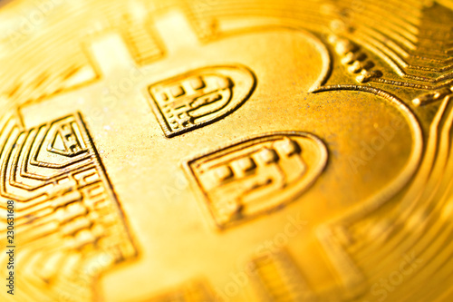 Virtual cryptocurrency money Bitcoin golden coin super macro image