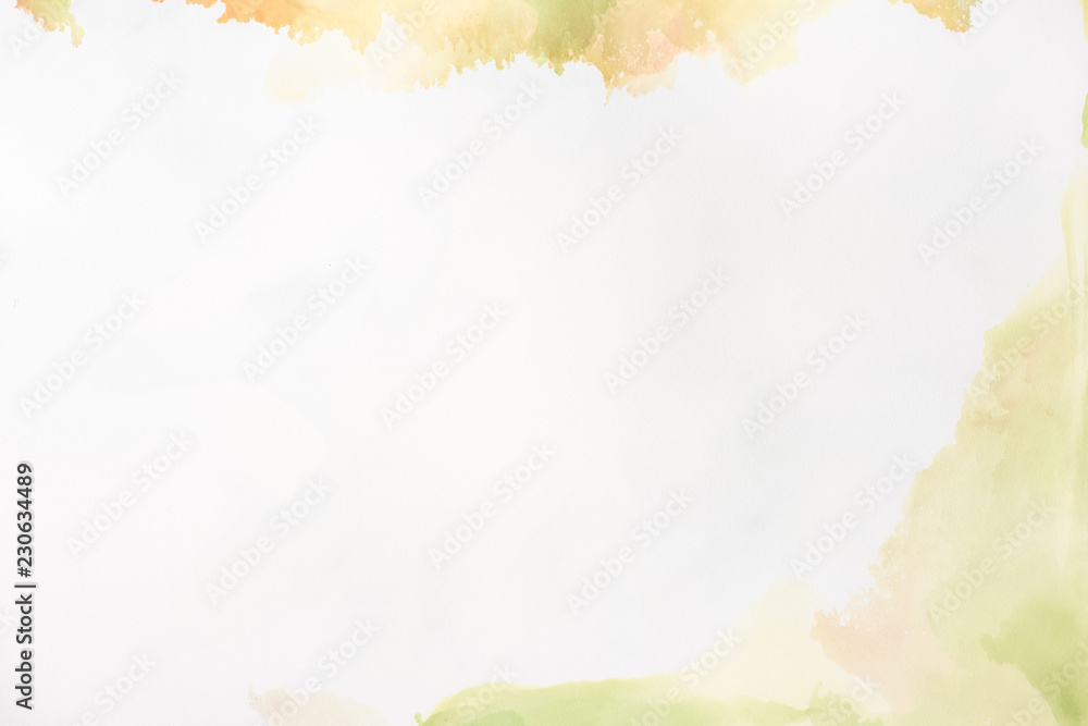 light brown and green splashes of alcohol inks on white as abstract background light brown and green splashes of alcohol inks on white as abstract background