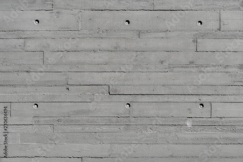 Dark concrete background surface, Texture of wooden formwork stamped on raw concrete wall as background