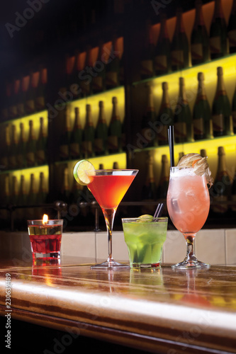 Three diferent cocktails on the bar