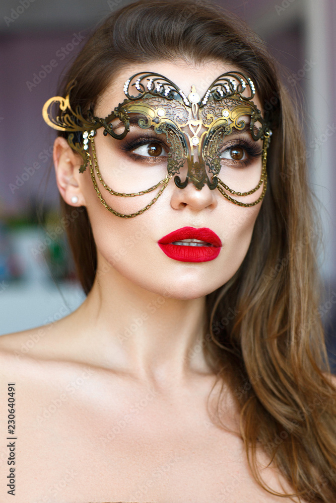 Beautiful woman portrait with red lips and mask on face. Beautiful woman portrait with red lips and mask on face.