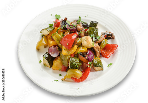 Sliced vegetables baked in the oven nice serving on a plate