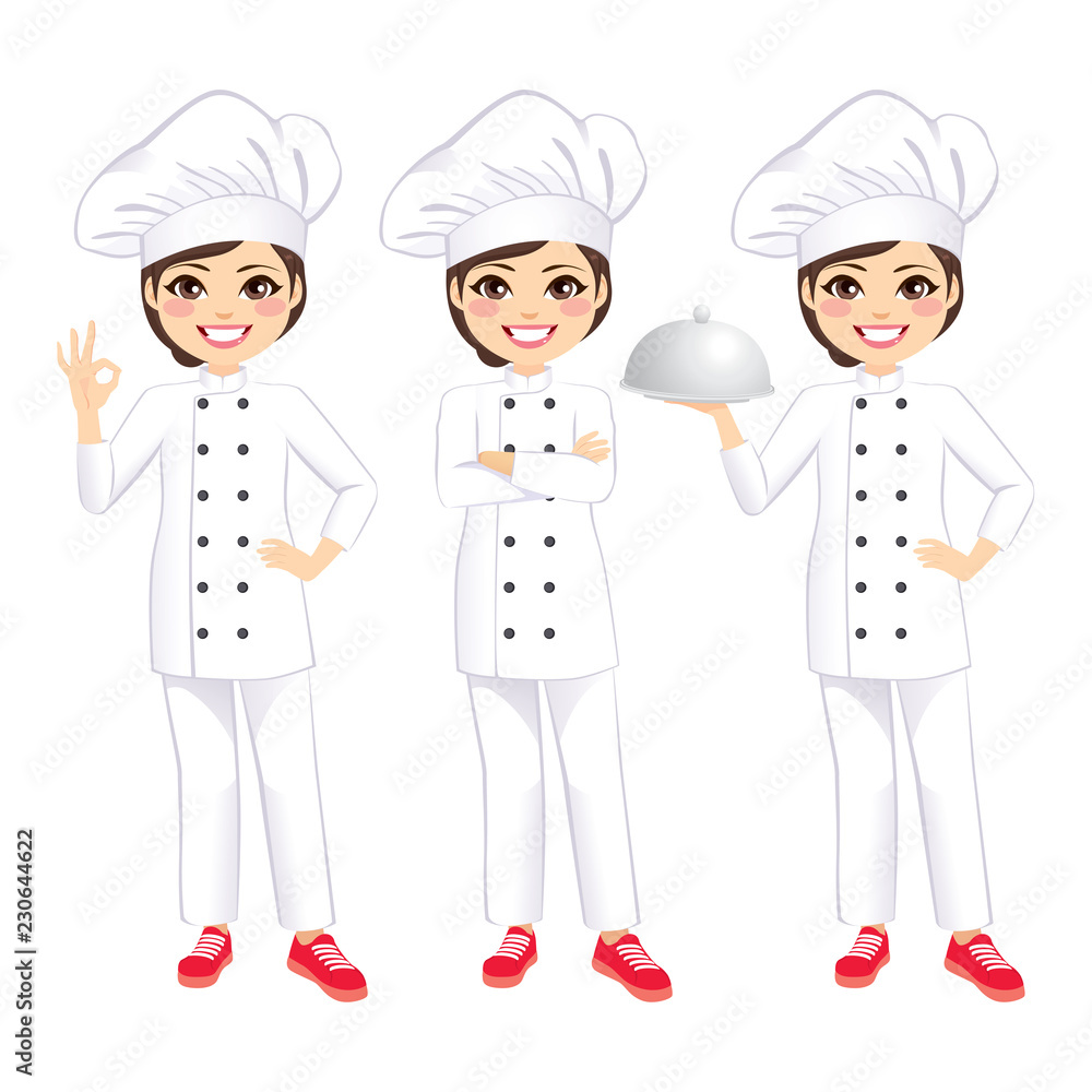 Young beautiful happy female chef holding silver tray and gesturing ok sign Young beautiful happy female chef holding silver tray and gesturing ok sign