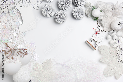 Christmas decorative composition of toys on a white table background. Top view. Flat Lay