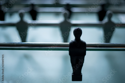 Table football table, football players close up black and white