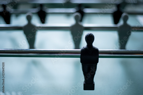 Table football table, football players close up black and white