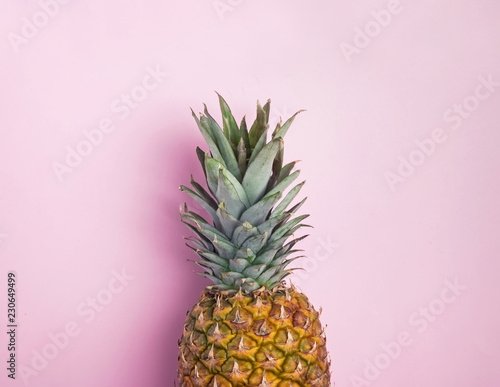 Part of pineapple on the pink background
