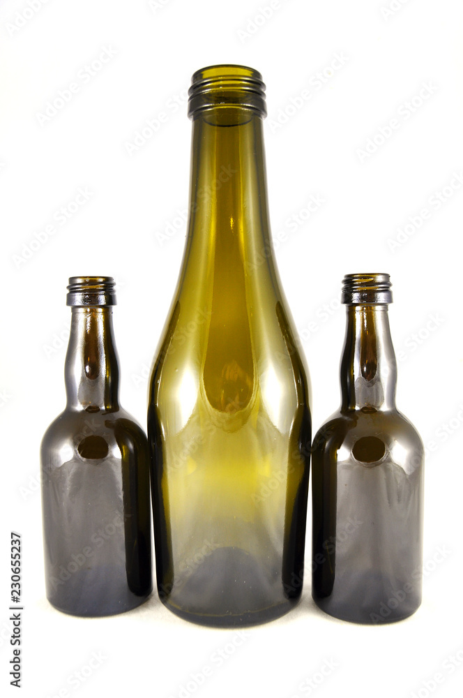 Wine bottles on white background close-up Wine bottles on white background close-up