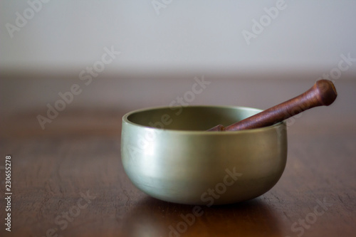 Tibetan Singing Bowl on wooden table