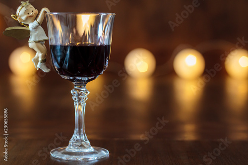 Glass of red wine with Christmas decoration