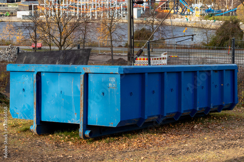 Large blue dumpster container