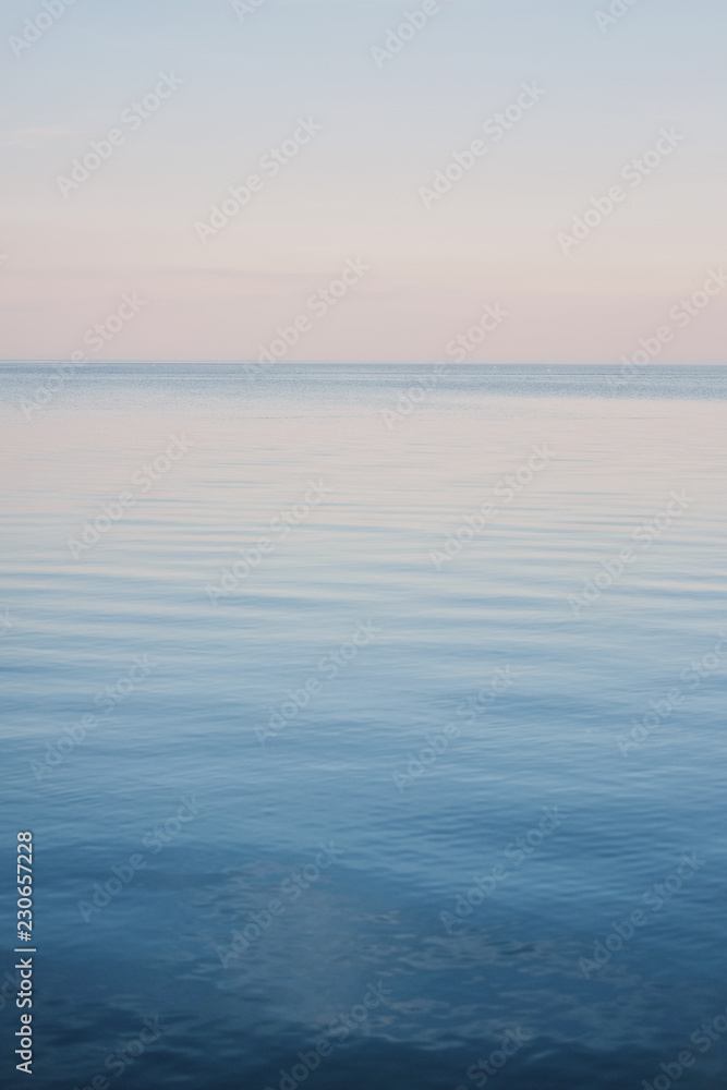 Fototapeta premium Blue sky landscape without clouds spreading on the sea