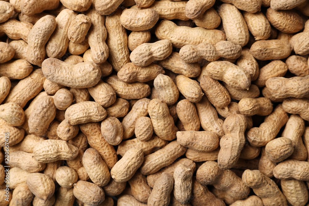 Dry peanuts in shell as background, top view. Healthy snack Dry peanuts in shell as background, top view. Healthy snack