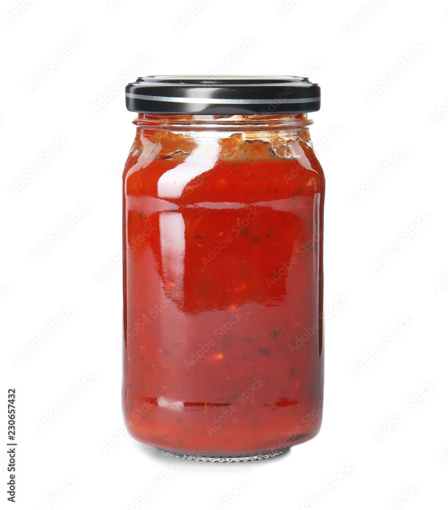 Tasty homemade tomato sauce in glass jar on white background Tasty homemade tomato sauce in glass jar on white background