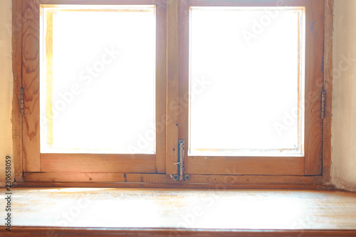 Wooden window. Wide wooden sill.