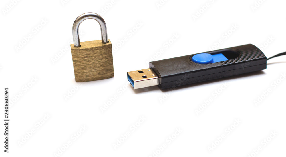 The concept of information storage. Padlock and usb flash drive. locked closed padlock with usb memory stick through it isolated on white background The concept of information storage. Padlock and usb flash drive. locked closed padlock with usb memory stick through it isolated on white background