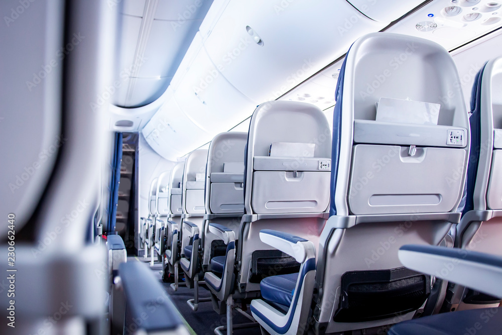 Airplane seats in cabin at economy class Airplane seats in cabin at economy class