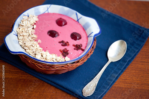 Cherry yogurt smoothie with oats, dried barberries and sour cherries