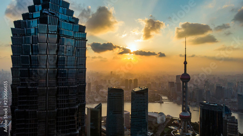Sunset of Shanghai Skyline and Silhouette Of Modern Megalopolis. photo