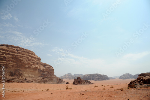  Jordanian desert in Wadi Rum, Jordan. Wadi Rum has led to its designation as a UNESCO World Heritage Site. It is known as The Valley of the Moon