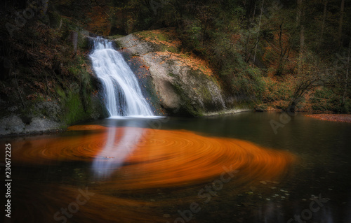waterfall in the Allgaeu mountains  Bavaria  Germany in autumnal atmosphere with colorful autumn foliage