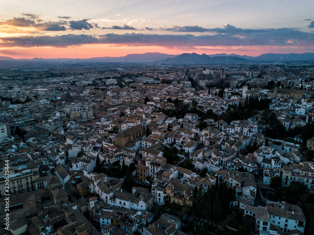 Aerial drone photograph of the city of Granada Spain at sunset