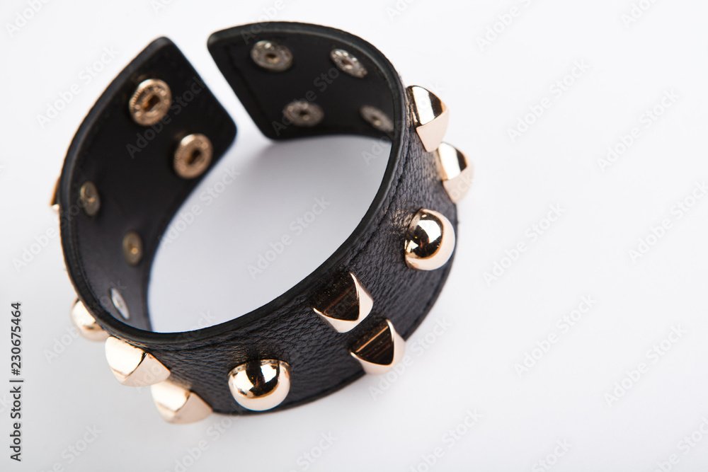 Obraz premium Black leather bracelet studio white background